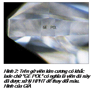 Text Box: Hình 2: Trên gờ viên kim cương có khắc lade chữ “GE POL” có nghĩa là viên đá này đã được xử lý HPHT để thay đổi màu. Hình của GIA 